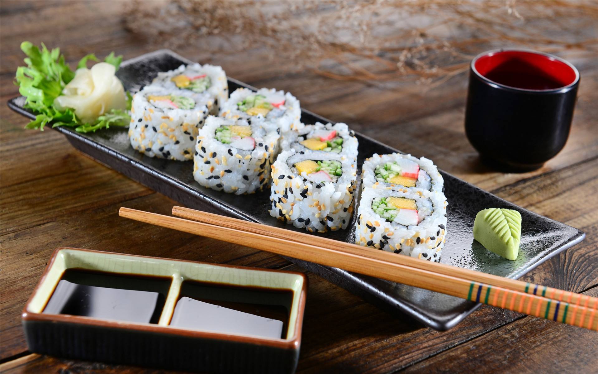 名食园寿司技术培训米和水的比例:寿司米淘洗净,沥干水,盛入电饭锅中